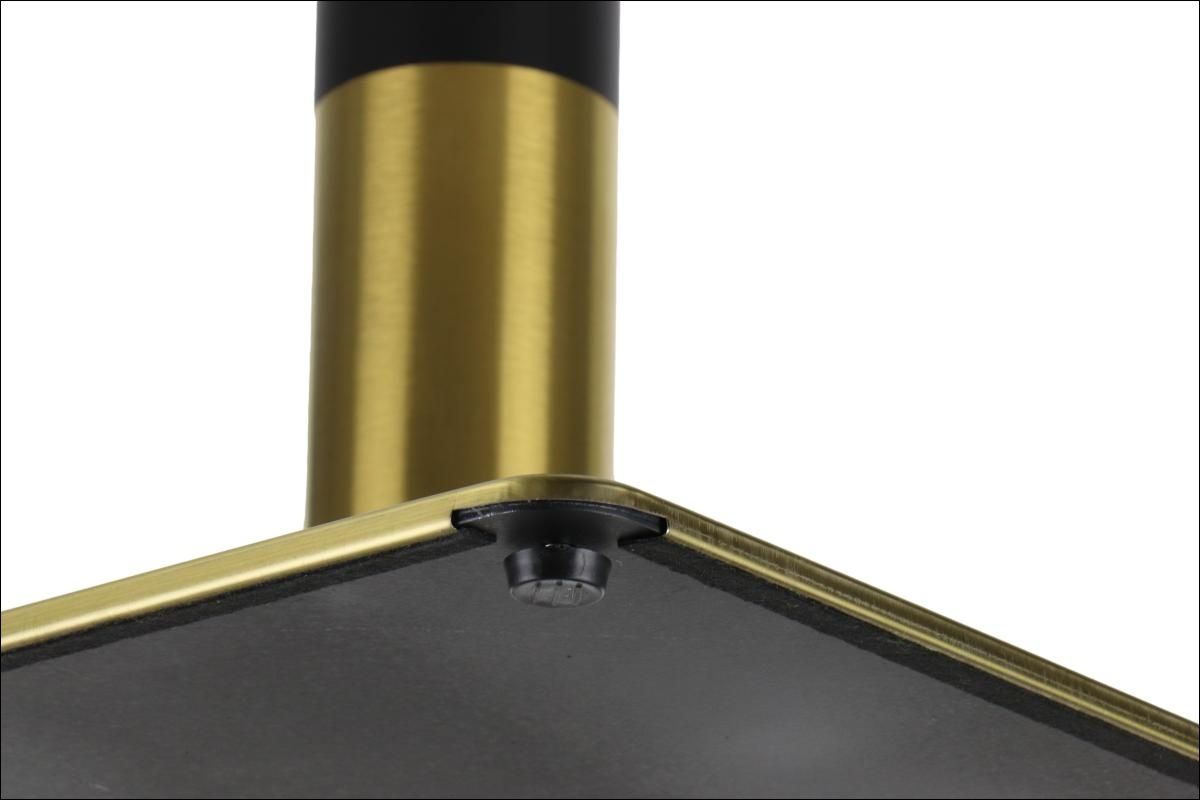 Elegancka podstawa do stolika wykonana ze stali nierdzewnej w kolorze złotym w połączeniu z elementami ze stali w kolorze czarnym.
